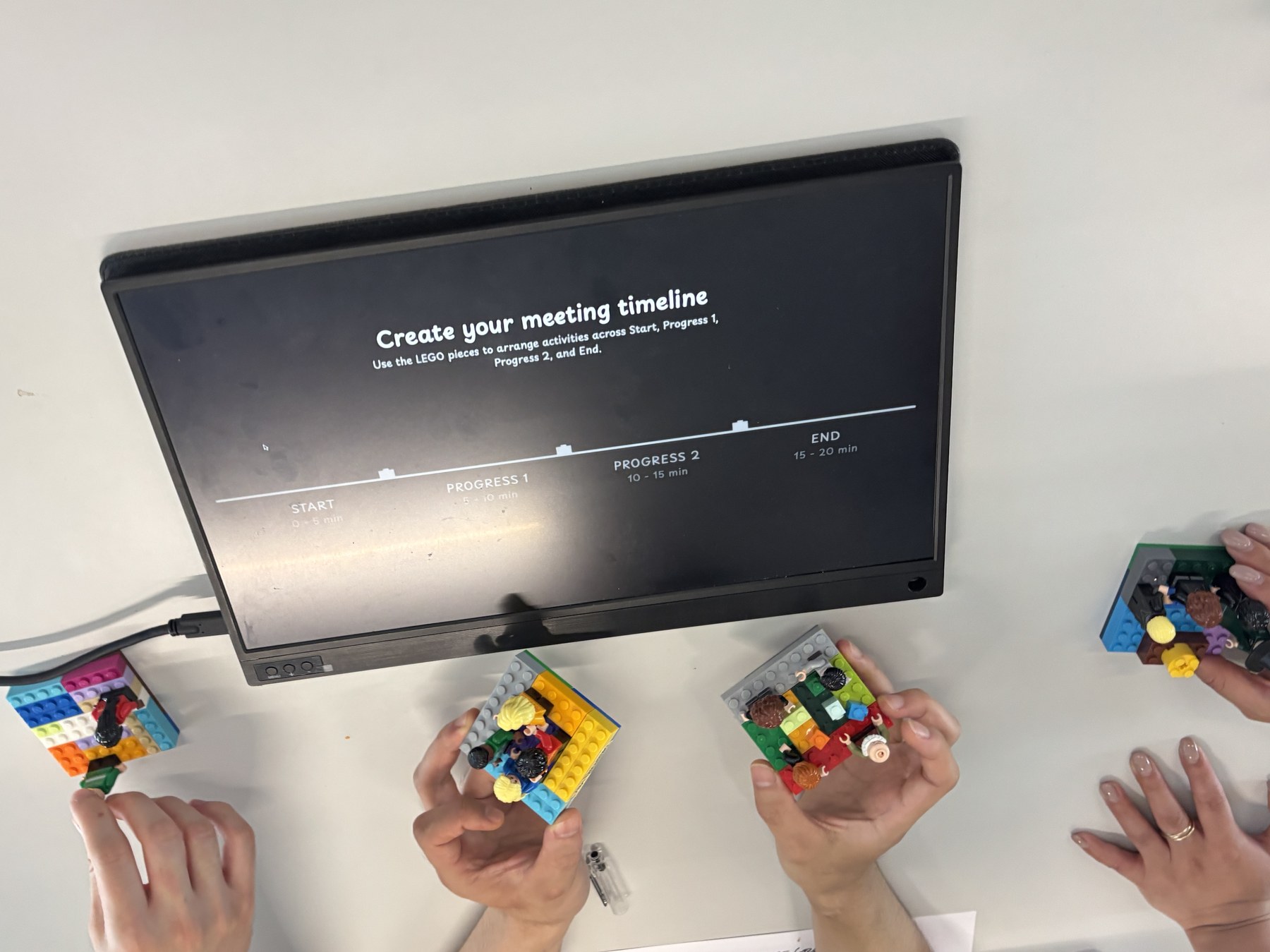 Participant interacting with the prototype using LEGO pieces